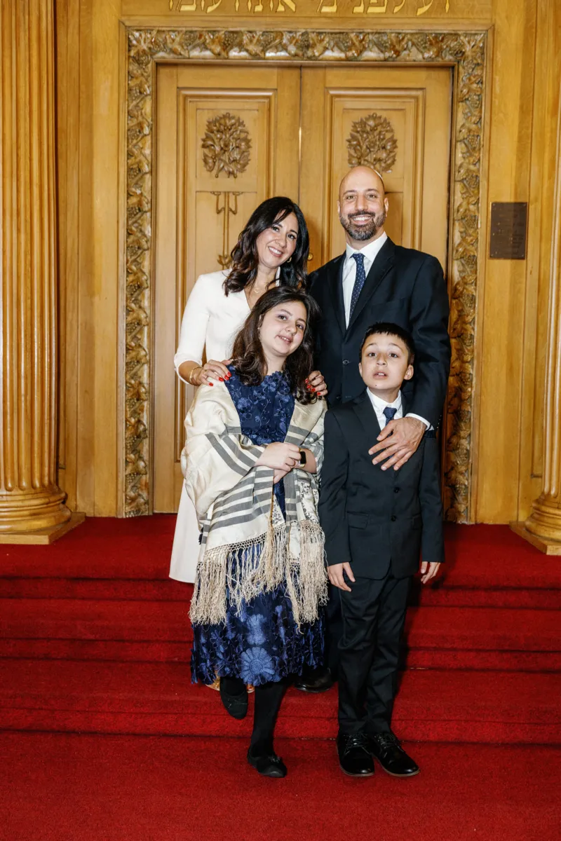 Parents with children after Bat Mitzvah ceremony